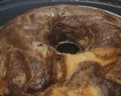 Step <p>ponemos la mantequilla , el aceite y 250g de azúcar en el vaso y molemos Segundos velocidad 5</p> illustration